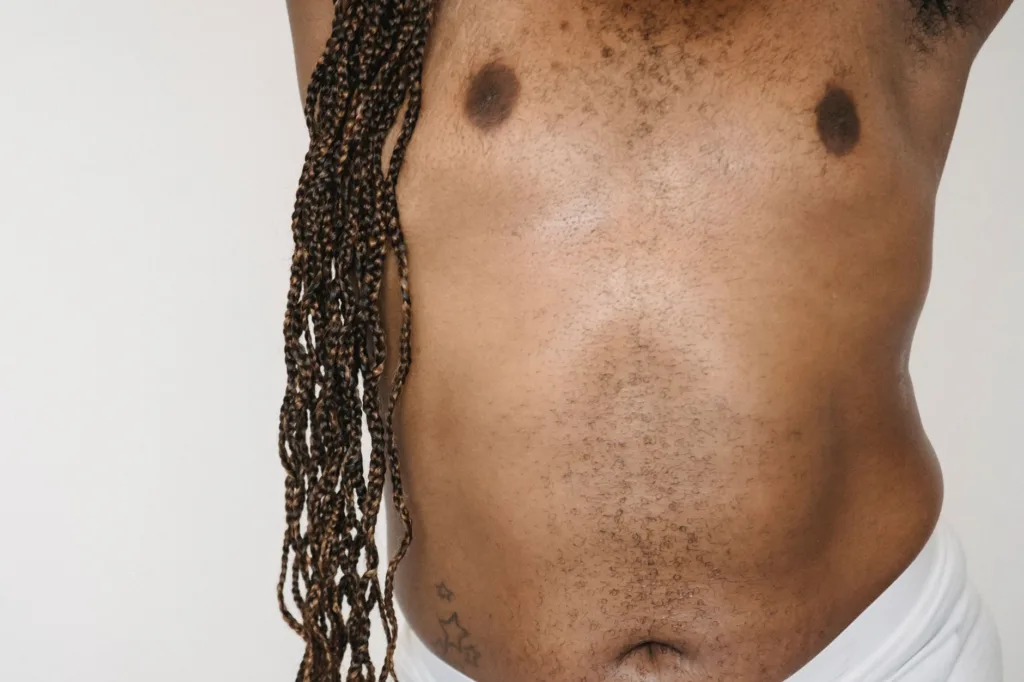 crop shirtless plump black man