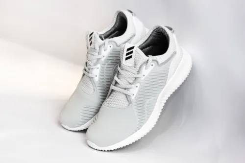 sneakers with dense surface against gray background