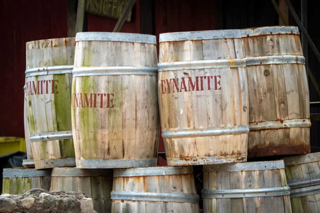 rustic dynamite barrels stacked outdoors